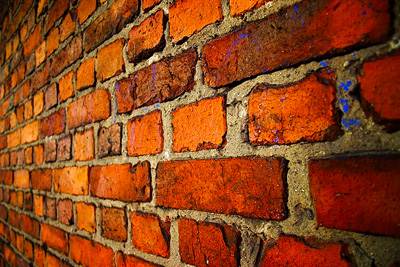 A brick wall needing mortar repair; photo courtesy Oula Lehtinen